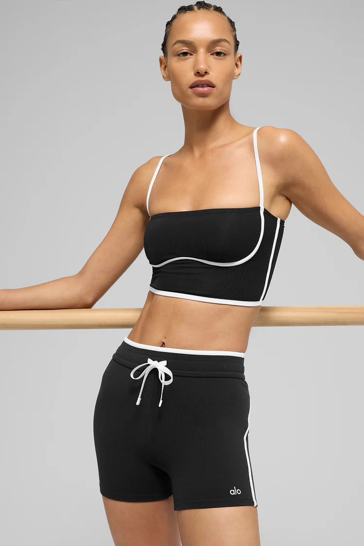 The Airbrush Streamlined Bra Tank in Black/White combines sleek, supportive design with breathable comfort, perfect for workouts or casual wear. Its minimalist style ensures a smooth, flattering fit for every body.